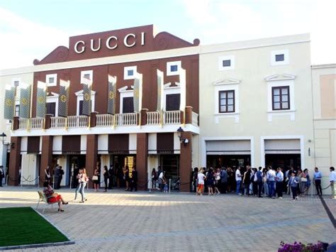 catania outlet gucci|sicilia outlet village website.